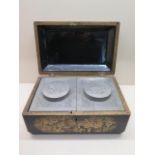 An Oriental gilt lacquered tea caddy with decorated pewter type two section interior - Height 16cm x