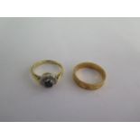 Two 18ct yellow gold rings sizes I/J - total weight approx 5.7 grams