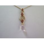 An 18ct yellow gold necklace with pink topaz and rose quartz drop - approx weight 5.6 grams - RRP £