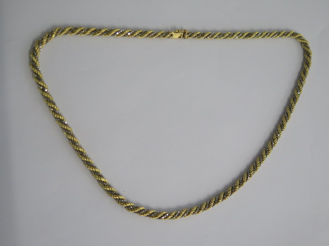 A hallmarked 18ct bi metal rope twist necklace - Length 52cm - approx weight 35.2 grams - good