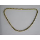 A hallmarked 18ct bi metal rope twist necklace - Length 52cm - approx weight 35.2 grams - good