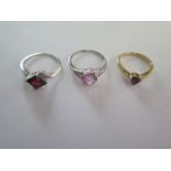 Two 9ct white gold rings, a yellow gold 9ct ring sizes N and R - total weight approx 6.7 grams - all