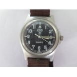 A CWC Military Quartz wristwatch with black dial - Width 38mm including winder - running,