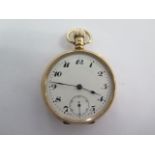 A 9ct yellow gold open face top wind pocket watch - 50mm case - approx weight 86 grams - running