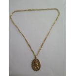A 9ct yellow gold St Christopher pendant - Height 4cm - on a 9ct 50cm chain - total approx weight