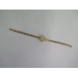 A Sovereign 9ct ladies quartz bracelet wristwatch - approx wight 8.6 grams - probably needs a new