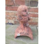 A barn owl roof ridge tile finial on a half round base - Length 18cm x Width 22cm x Height 45cm