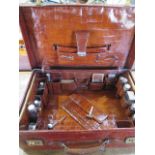 An Edwardian crocodile leather gentleman's vanity case , trunk, by Mappin and Webb , the hinged