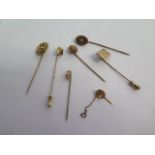 A collection of five 9ct stick pins, a gilt pin and a 15ct pin - total weight approx 11.8 grams