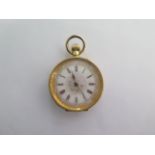 An 18ct yellow gold pocket watch, top wind, base metal back - 33mm case - running - total weight