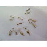 Six pairs of 9ct gold earrings - weight approx 3.7 grams