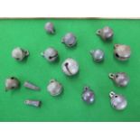 A collection of 15 rumble bells - largest 34mm wide