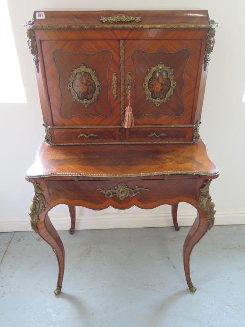 A good 19th Century kingwood, rosewood and ormolu mounted Bonheur du Jour with cavetto top, enclosed