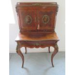 A good 19th Century kingwood, rosewood and ormolu mounted Bonheur du Jour with cavetto top, enclosed