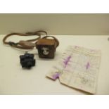 A United Optical Instrument Merlin miniature camera with leather case and instructions - shutter