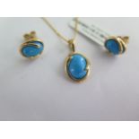 A 9ct yellow gold turquoise pendant and a pair of 9ct yellow gold turquoise stud earrings - total