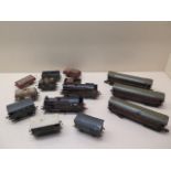 Three early tinplate Marklin OO gauge coaches, two 0-4-4 locos (make unknown) and nine wood and