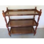 A Victorian mahogany three tier dumb waiter - Height 109cm x 104cm x 41cm