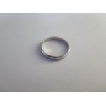 A platinum 3mm band ring size K - approx weight 3.4 grams - generally good, some usage marks