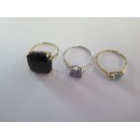 Two 9ct yellow gold rings and a white gold ring sizes R - one with certificate - total weight approx