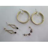 A pair of 9ct gold earrings - total weight approx 10.5 grams