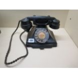 A black Bakelite 200 series telephone with drawer - no bell box - small chip to front of case