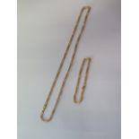 A 9ct yellow gold 46cm necklace and a matching bracelet - total weight approx 6.8 grams