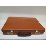 A very good quality tan leather briefcase retailed by by Dugand of Bruxelles possibly by Papworth