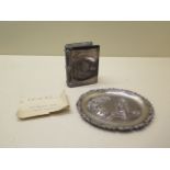 An Eastern white metal presentation pin dish and a white metal book - Height 9cm marked Kolhapur -