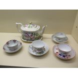 A Newhall teapot with stand, pattern 1597, circa 1815, three Newhall tea bowls, circa 1780's