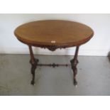 A Victorian inlaid walnut oval side table with good colour - Height 71cm x 75cm x 50cm