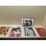 A collection of seven boxing autographed photos including Mohammed Ali, Joe Bugner, Henry Cooper