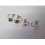 A pair of 9ct screw back black pearl earrings and a pair of silver pearl screw back earrings -