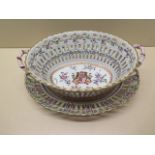 A French porcelain Amorial basket on stand - Height 10cm x Width 25cm - both in good condition