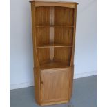 An Ercol elm corner cabinet with a single door - Height 160cm - as new