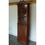 A good quality mahogany and inlaid corner cabinet - in good condition - Height 215cm