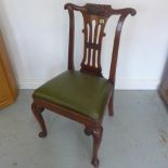 An antique walnut single chair on cabriole legs