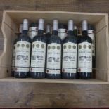 Eleven bottles of Chateau Belair-Coubet Cuvee Tradition Cotes de Bourg 2012 red wine - some seals