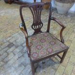 A Georgian mahogany elbow chair 91cm tall - seat height 42cm