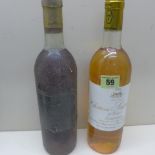 A bottle of Chateau Guiteronde 1984 Sauternes wine level to base of neck and a bottle of Chateau
