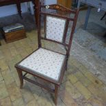 An Edwardian mahogany and inlaid bedroom chair