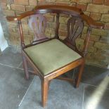 A Georgian mahogany corner chair