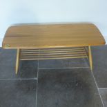 An Ercol Golden Dawn blonde elm coffee table with under tier - Height 37cm x 104cm x 46cm - minor
