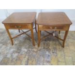 A pair of burr walnut lamp/coffee tables with a drawer on splayed legs made by a local craftsman