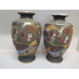 A pair of Japanese vases with figures and landscapes, signed to bases - Height 32cm - some wear to