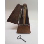 R Cooks & Co a Metronome de Maelzel in a walnut case - working - Height 24cm