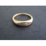 An 18ct yellow gold 5 stone diamond ring, size L, approx 4.7 grams, good condition
