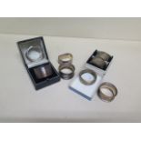 A collection of 8 silver serviette rings - total approx 5.2 troy oz