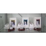 Three boxed Swarovski Masquerade figures - Harlequin, Pierrot and Columbine - all with stands,