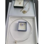 A 925 silver choker and a silver dress ring, size R, and a 9ct yellow gold pendant on a gilt chain